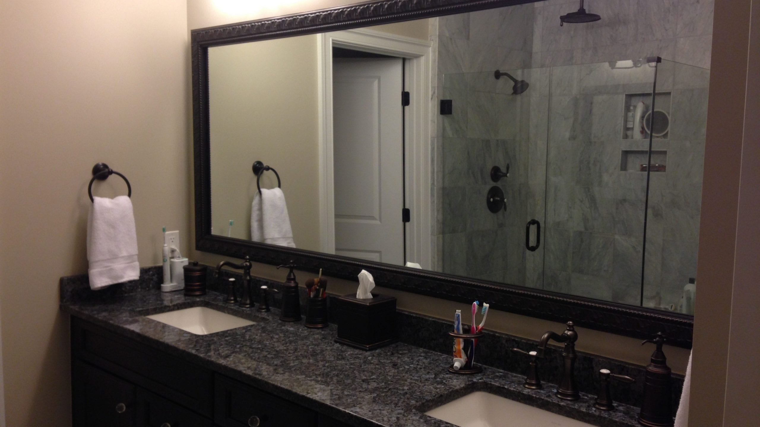 Customer Photos: A frame for every bathroom in Virginia home.
