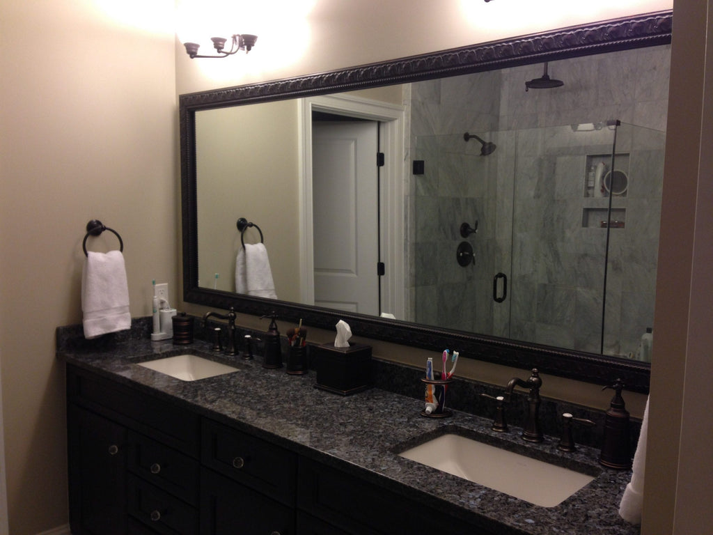 Customer Photos: A frame for every bathroom in Virginia home.