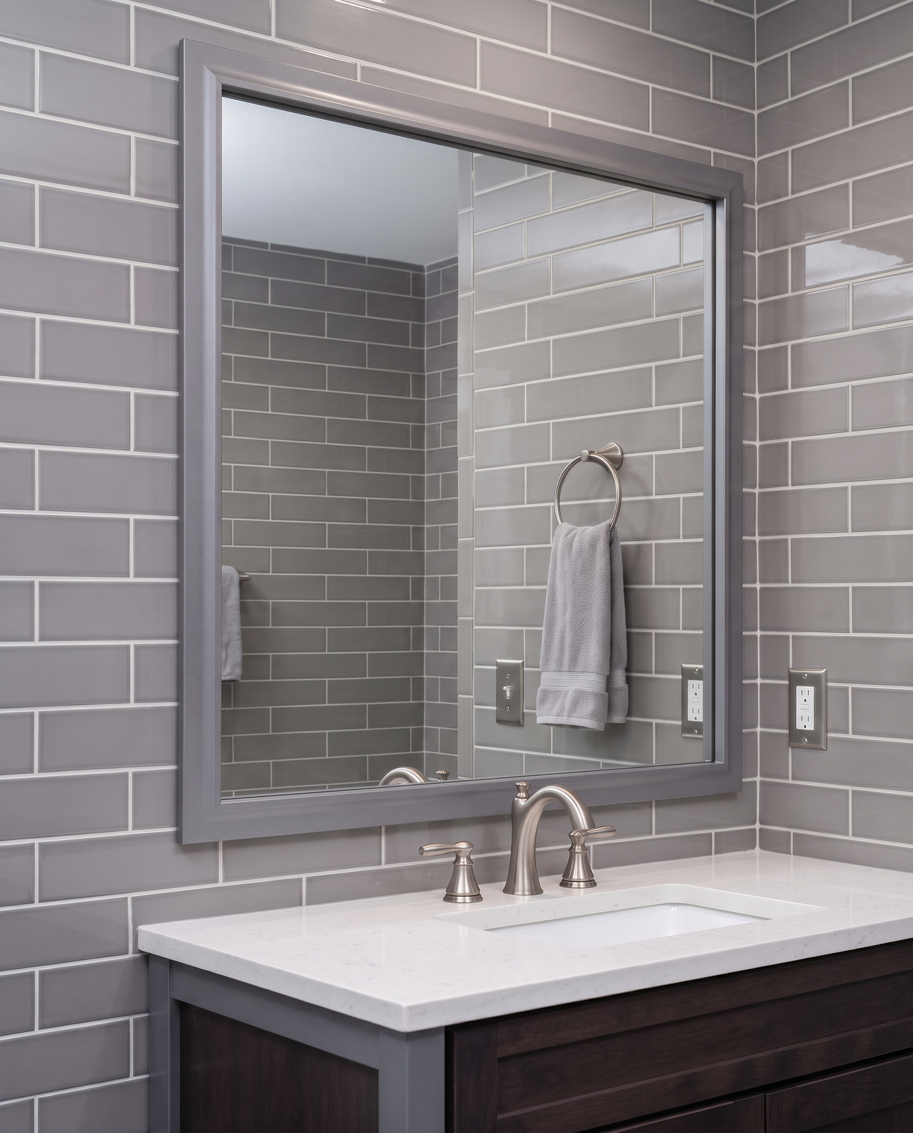 Avery Dark Gray Reverse mirror frame in remodeled residential bathroom