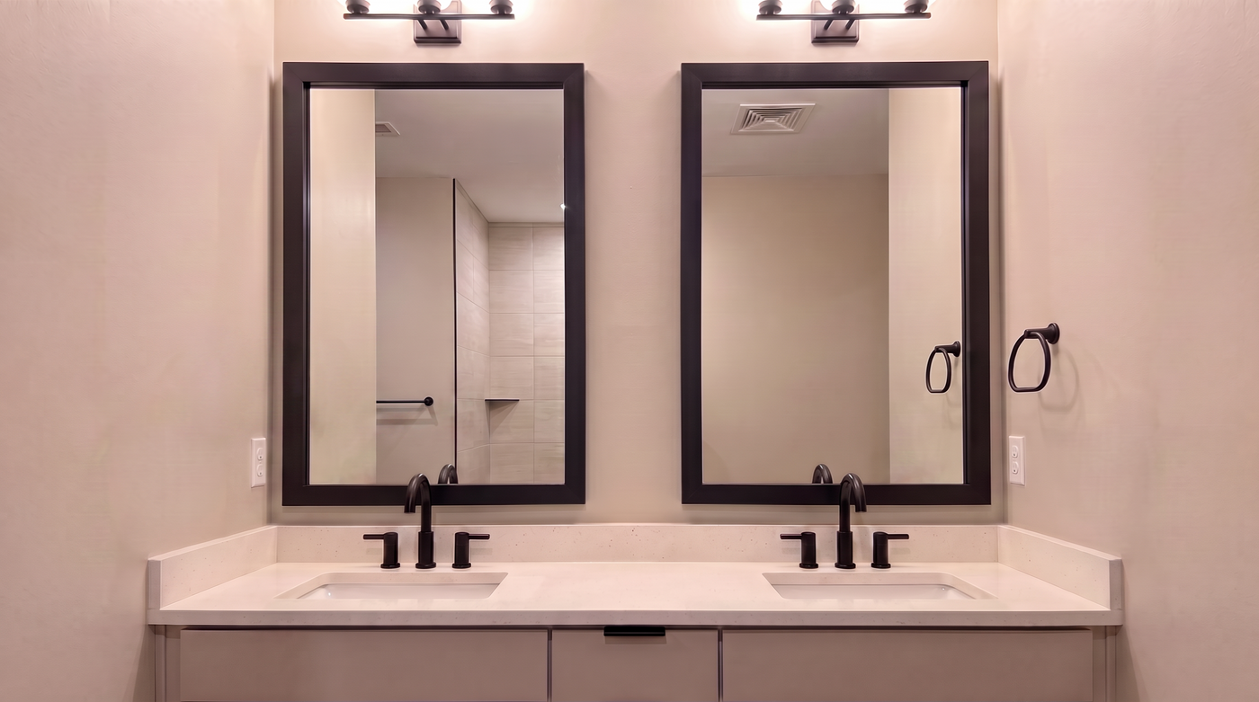Meade Black mirror frame in multi-unit apartment bathroom