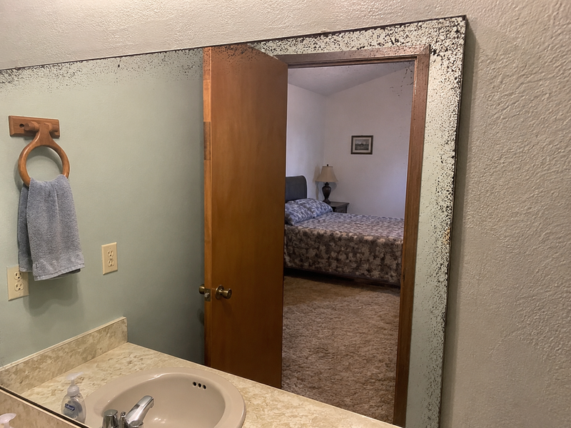 Deteriorating mirror in motel