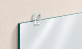 Mirror with bulky plastic clip